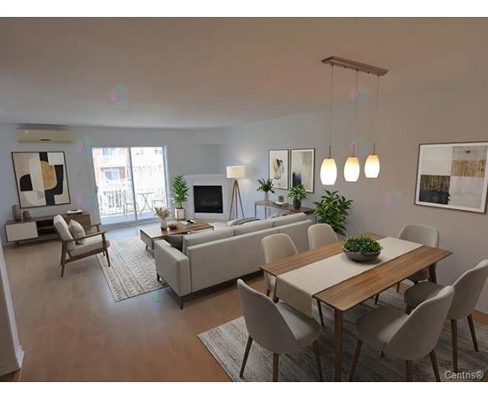 A modern living room with a dining table and chairs.