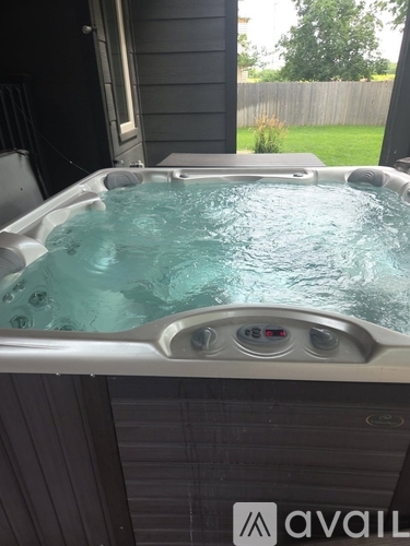 A hot tub with Avail logo on the side.