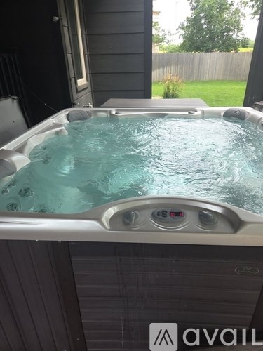 A hot tub with Avail logo on the side.
