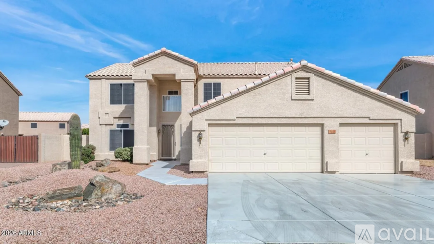 A modern house with a garage is available for sale.