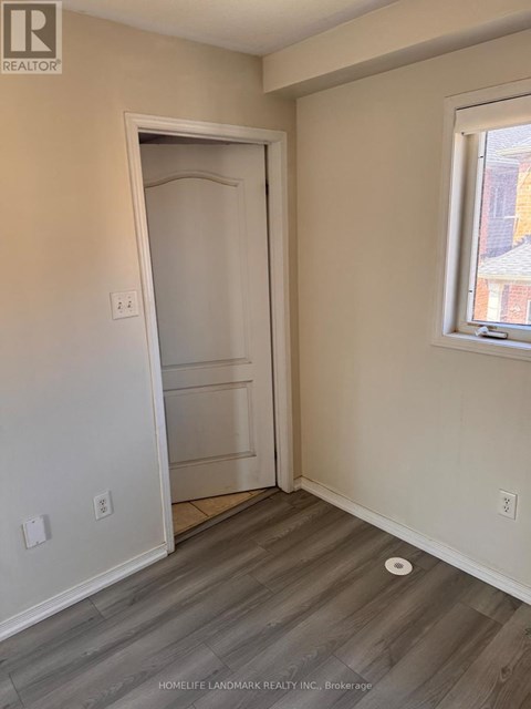 A room with a door and a window.