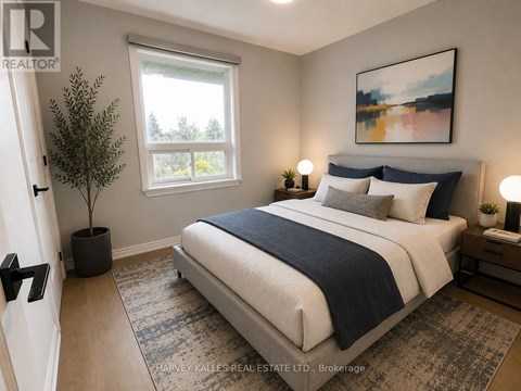 A bedroom with a large bed and a painting on the wall.