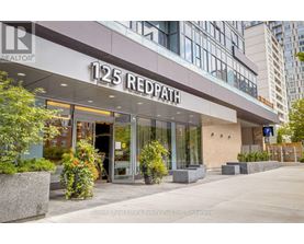 The front of a building with the sign 125 Redpath on it.