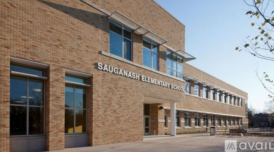 A brick building with the words Sauganash Elementary School on it.
