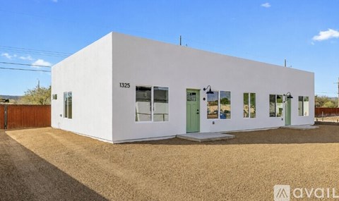 A white building with the number 1325 on it.