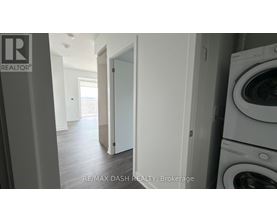 A laundry room with a washer and dryer.