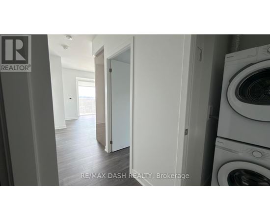 A laundry room with a washer and dryer.
