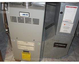 A gas furnace with a heat pump attached to it.