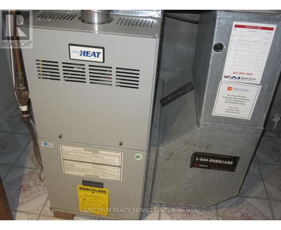 A gas furnace with a heat pump attached to it.