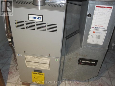 A gas furnace with a heat pump attached to it.