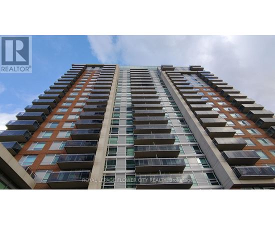 A tall building with a sign that says "Royal LePage Flower City Realty Brokerage".