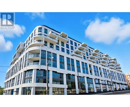 A modern building with a glass facade and a sign that reads "REALTOR".