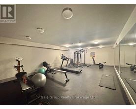 A gym with a variety of equipment including a bench press, a leg press, a squat rack, a treadmill, a rowing machine, a stationary bike, a medicine ball, and a yoga mat.