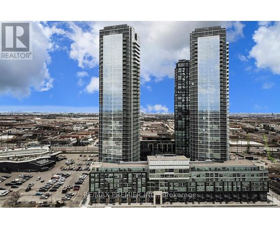 Two tall buildings with the words REALTOR and REMAX PREMIER on them.