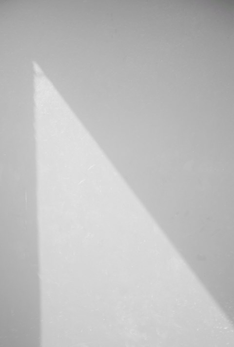 A white sheet of paper is placed on a white background.