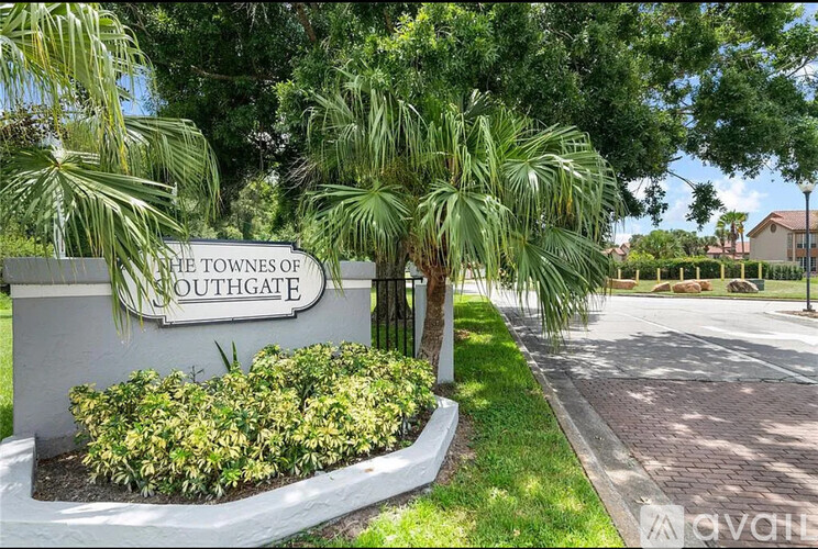 A sign that says "The Town of Southgate" is surrounded by greenery.