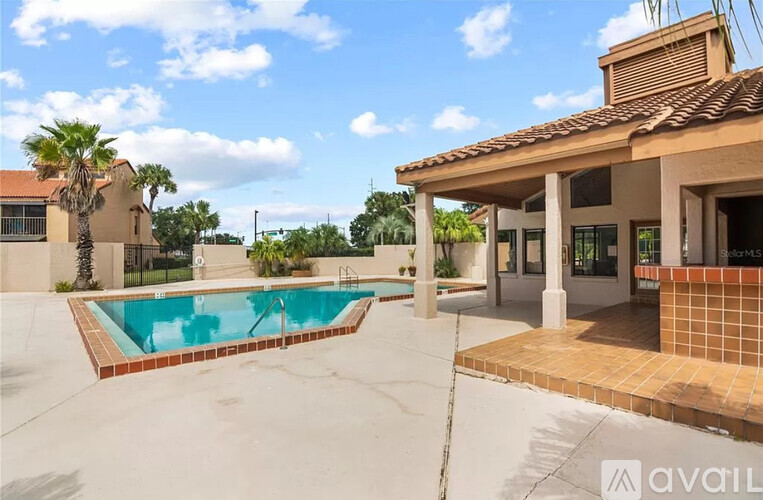 A house with a pool in the backyard.