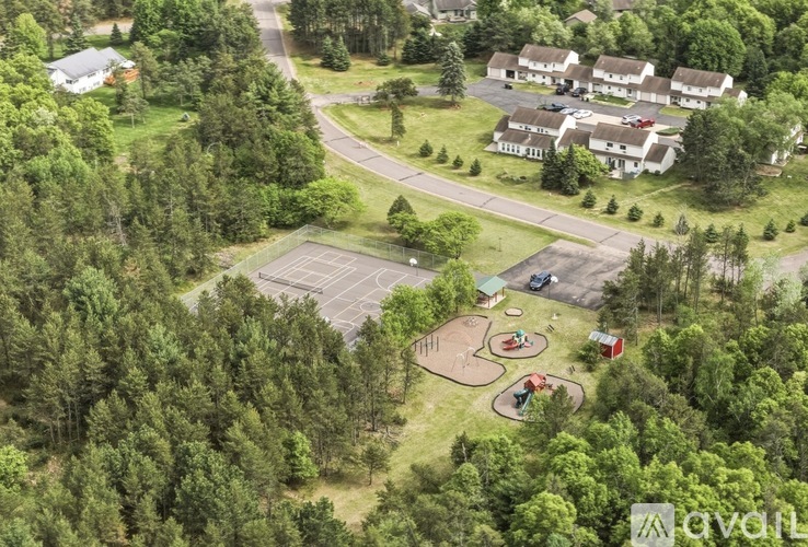 A bird's eye view of a residential area with a playground.