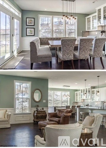 A living room with a couch and chairs and a dining room with a table and chairs.