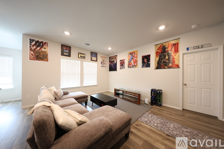 A living room with a couch and a coffee table.
