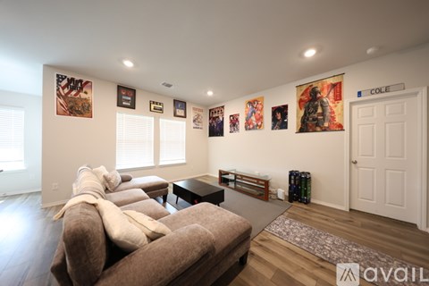 A living room with a couch and a coffee table.
