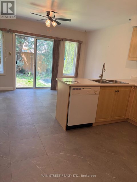 A kitchen with a washer and dryer built in.