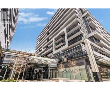 The Agency Brokerage is a modern building with a glass facade.