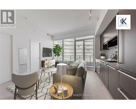A modern living room with a dining area and kitchen in the background.