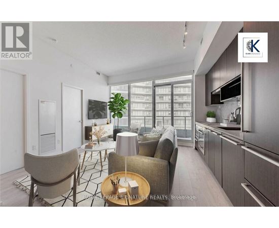 A modern living room with a dining area and kitchen in the background.