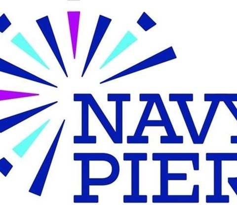 The image features the words "NAVY PIER" in bold, blue letters with a vibrant, multicolored burst emanating from behind the text.