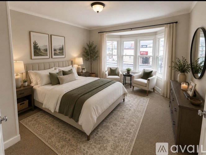 A well-lit bedroom with a large bed and a view of the city through the window.