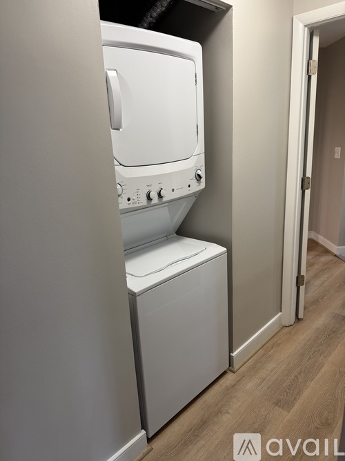 A white dishwasher is installed in a kitchen.