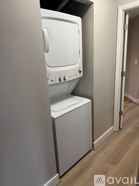 A white dishwasher is installed in a kitchen.