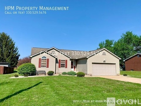A house with the text "HPM PROPERTY MANAGEMENT" and a phone number on the top left corner.