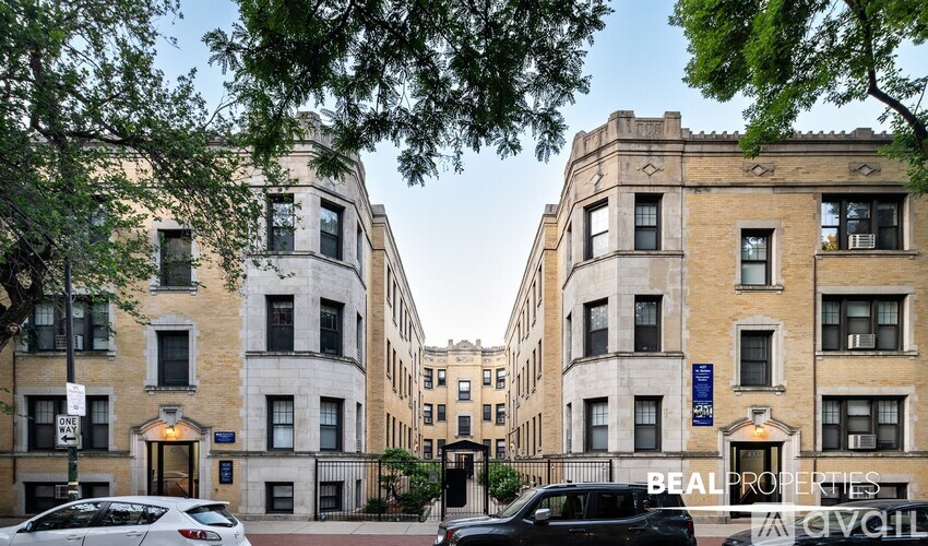 A street view of a building with the sign "BEAL PROPERTIES" on it.