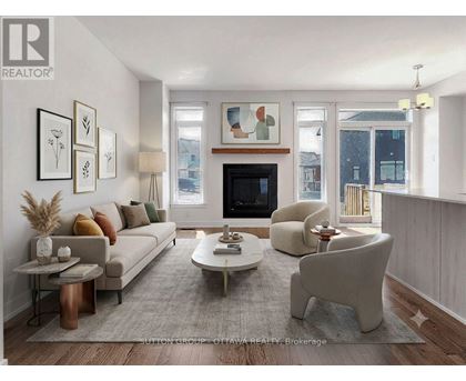 A living room with a fireplace and a couch.