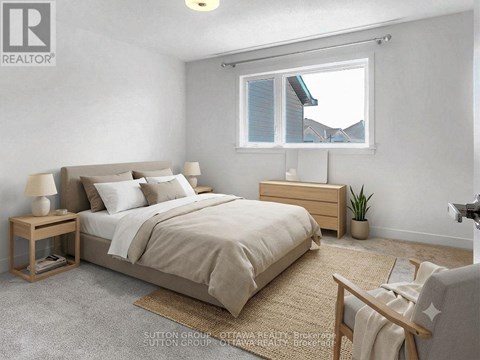 A bedroom with a large bed, a nightstand, and a window with a view of the roof of a house.