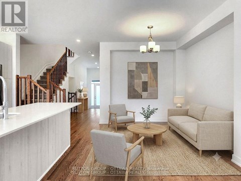 A living room with a couch, chair, and coffee table.