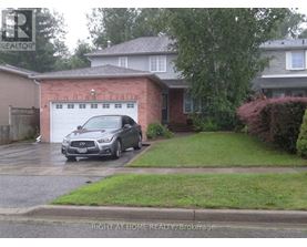 A car is parked in front of a house with a sign that says "Right at Home Realty, Brokerage".