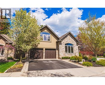 A house with a driveway and a garage door.