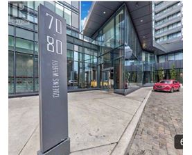 A tall sign with the numbers 70 and 80 on it.