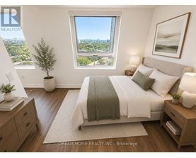 A bedroom with a large bed, a window with a view, and a nightstand with a lamp.