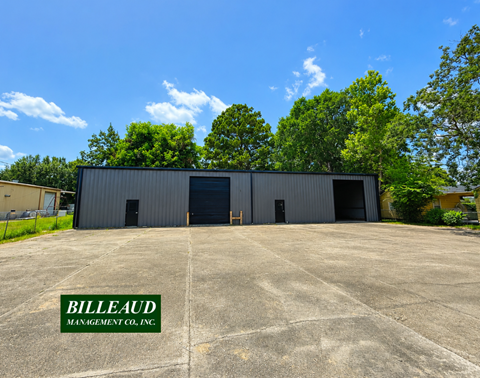 A large industrial building with the name Billeaud Management Co. Inc. on the ground.