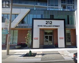 The front of a building with the number 212 and the name King William Street on it.
