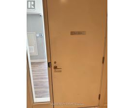 A white door with a sign that says "Party Room".