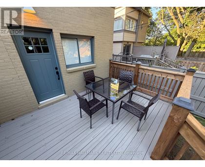 A patio with a table and chairs is shown.