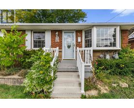 A house with the number 71 on the front door.