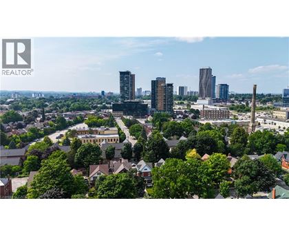 A cityscape with a mix of residential and commercial buildings.