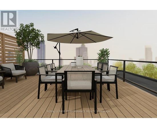 A table set for six with a view of the city.