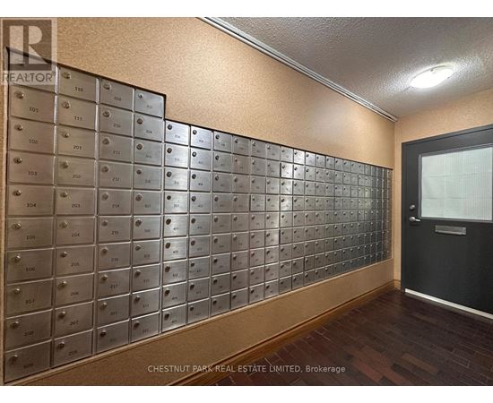A wall of mailboxes with numbers ranging from 101 to 278.